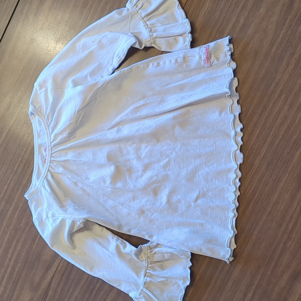 Cream Ruffle Butts Top